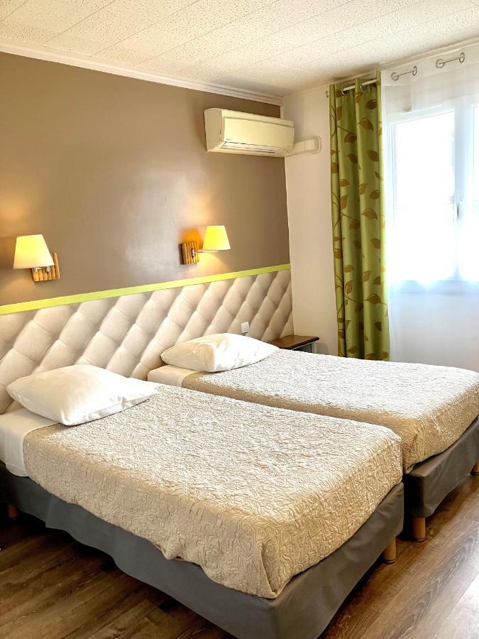 Hotel Lou Marques Saintes-Maries-de-la-Mer Bagian luar foto